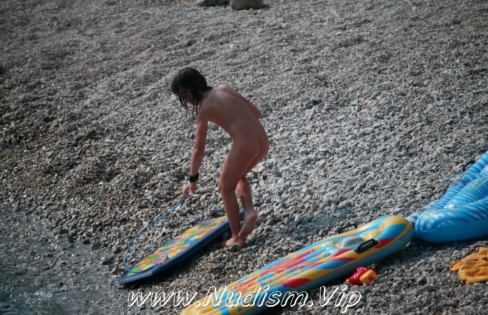 [Image: Naturist-Surf-Board-Glides-Purenudism-Pics-1.jpg]
