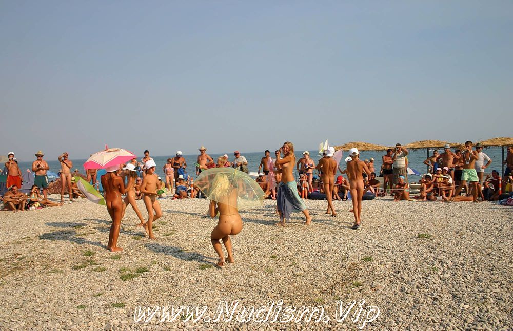 [Image: Pure-Nudism-Images-Ribbon-and-Umbrella-Dance-1.jpg]